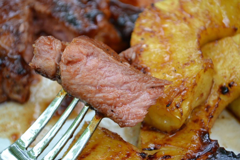 Finished and sliced Grilled Pork Steak with Pineapple