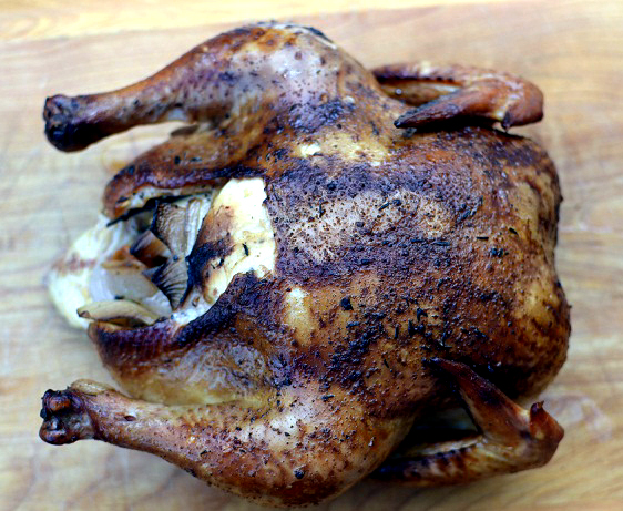 Smoked whole chicken with charred skin