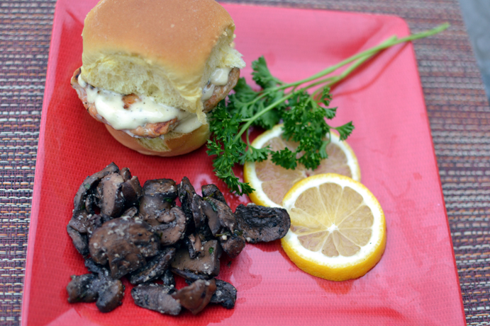 Grilled Salmon Burger with mushrooms and lemon