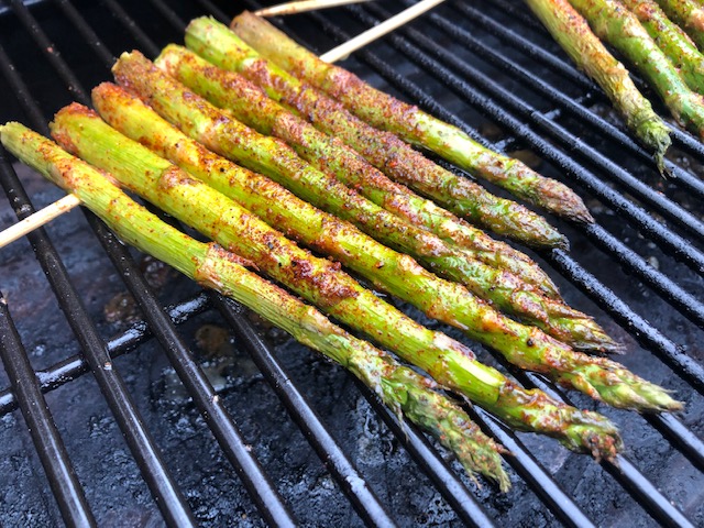 Asparagus cooking on smoker